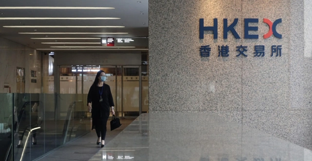 港股午评：恒指震荡跌0.08％，内房股、黄金股表现抢眼